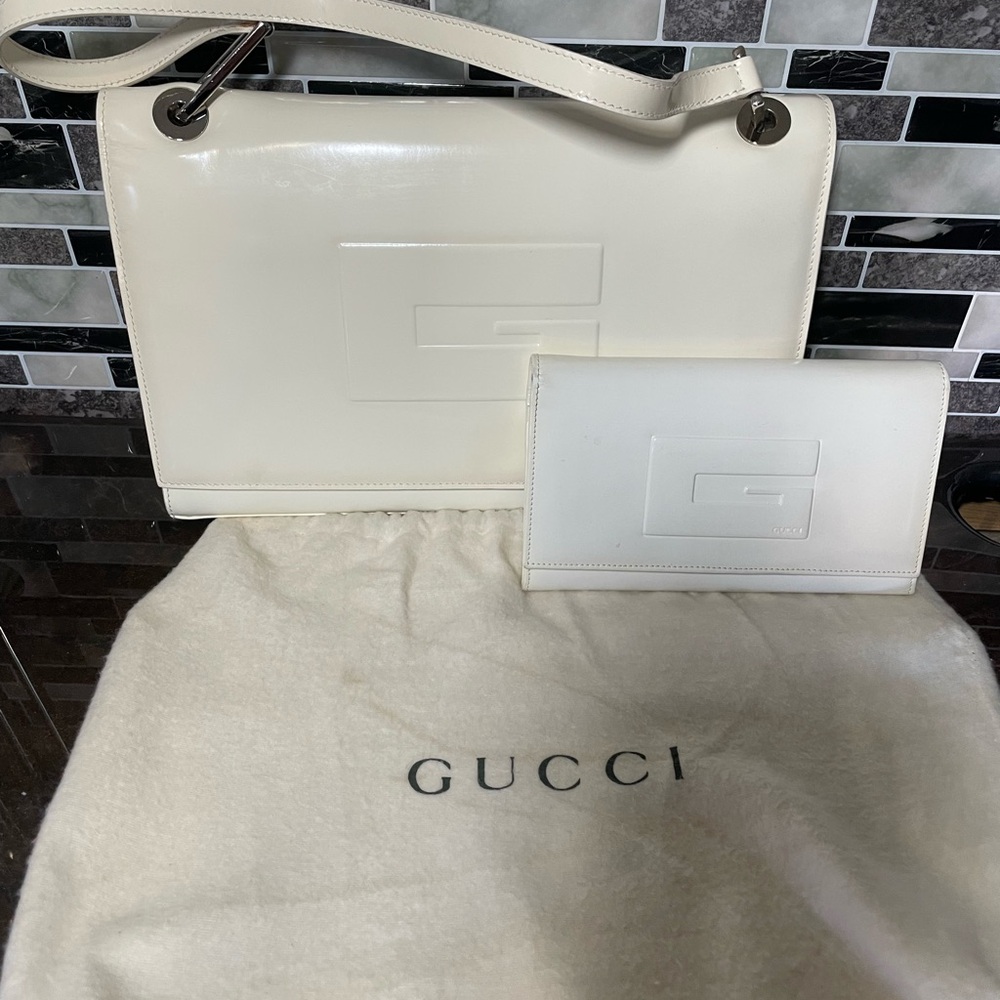 Authentic vintage Gucci patent leather shoulder bag and wallet.